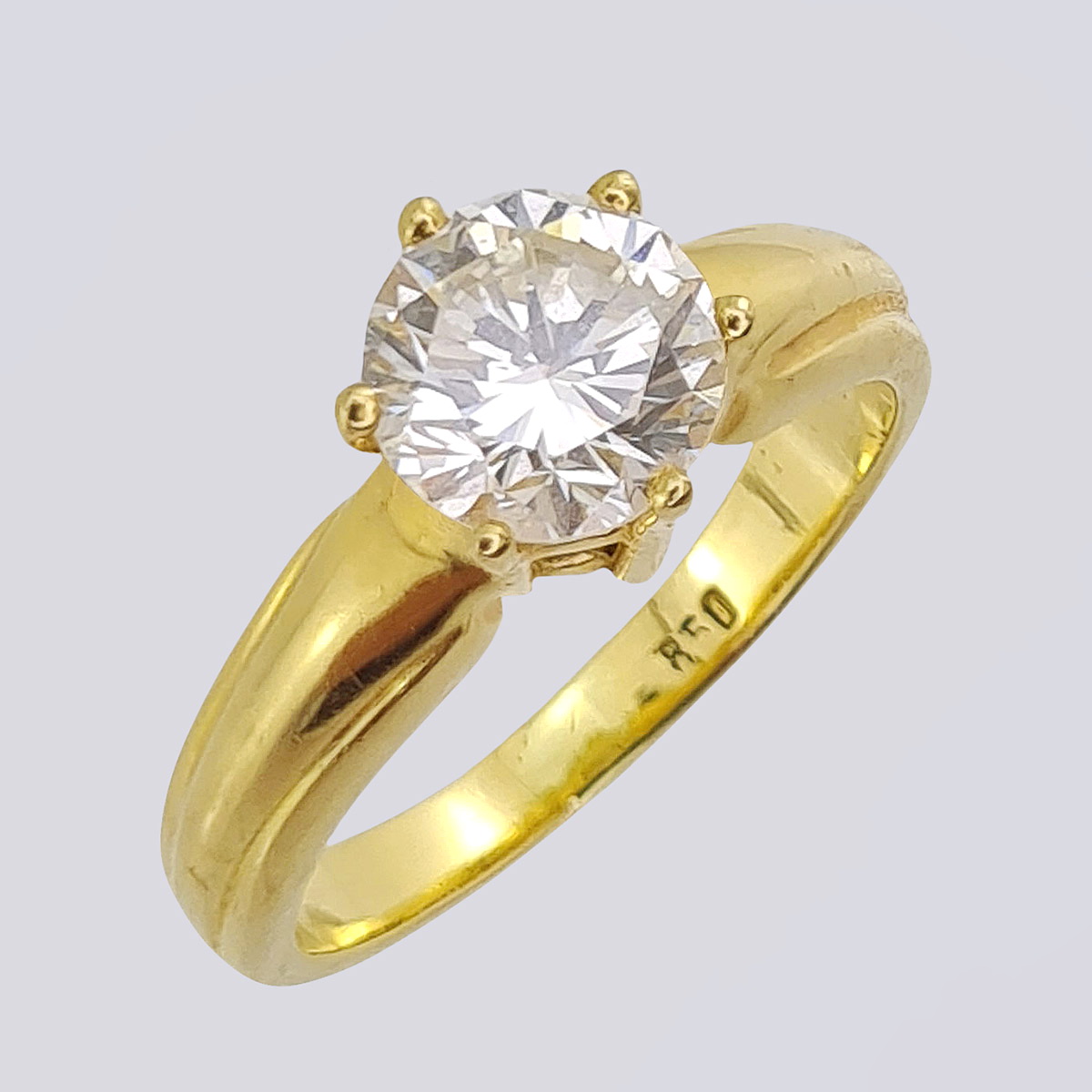 Кольцо золотое 750 пробы с бриллиантом современной огранки - 0.98 карат 7/6