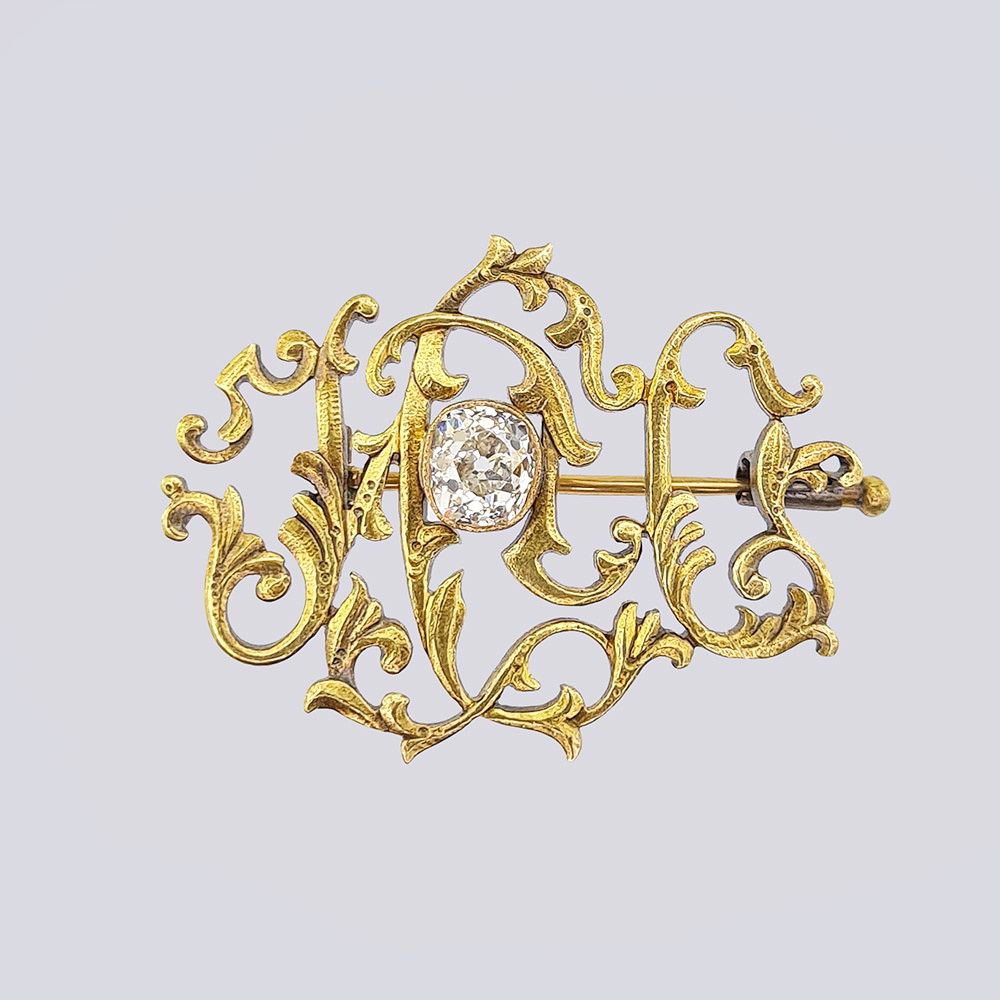 Брошь-вензель с бриллиантом из золота 56 пробы 19 века