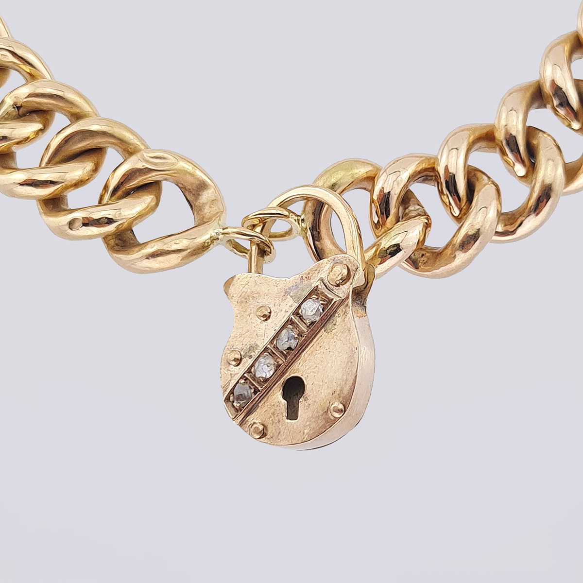 Дутый браслет из золота 56 пробы с замочком с 4 алмазами 19 века