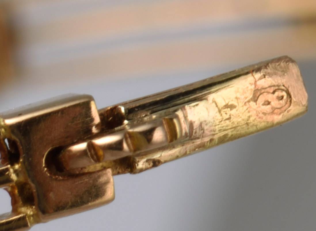 Жесткий браслет с бриллиантами из золота 56 пробы 19 века
