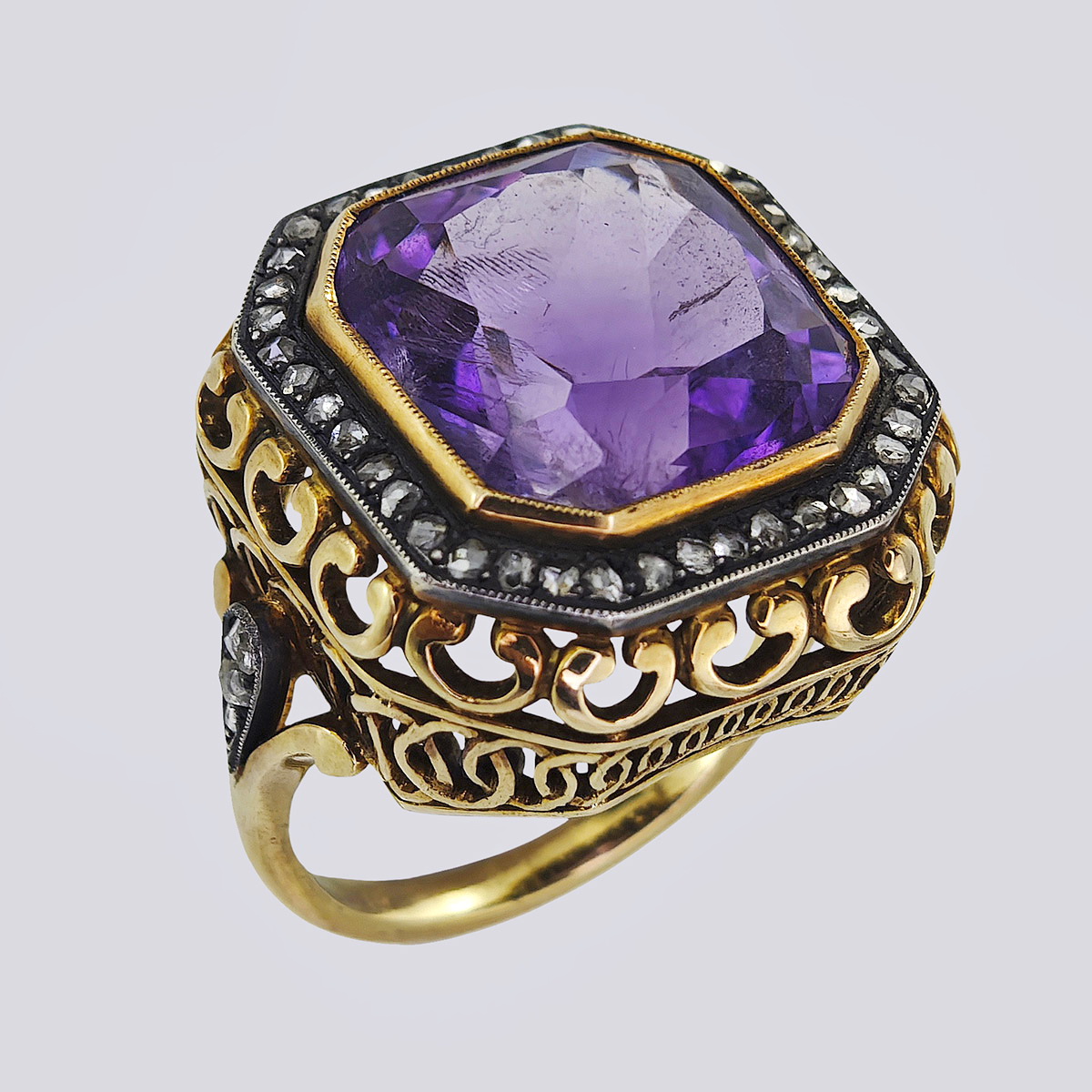 Кольцо золотое 585(56) пробы и серебряное 875 пробы с бриллиантами и аметистом