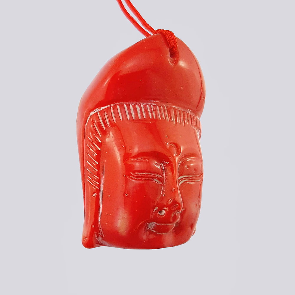 Статуэтка «Голова Будды» из коралла (Китай, XX век)