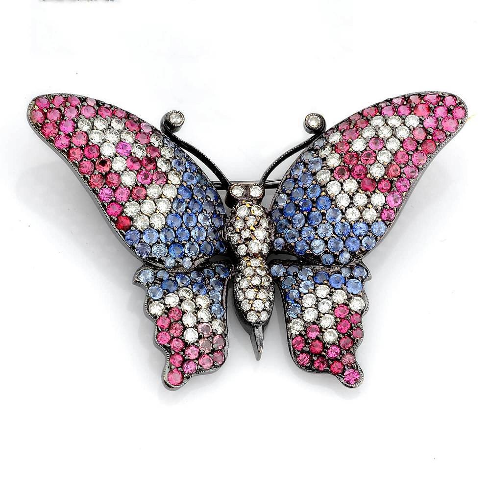 Авторская брошь «Бабочка» с сапфирами, рубинами и бриллиантами из золота 750 пробы