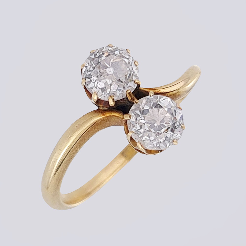 Кольцо с двумя бриллиантами из золота 56 пробы