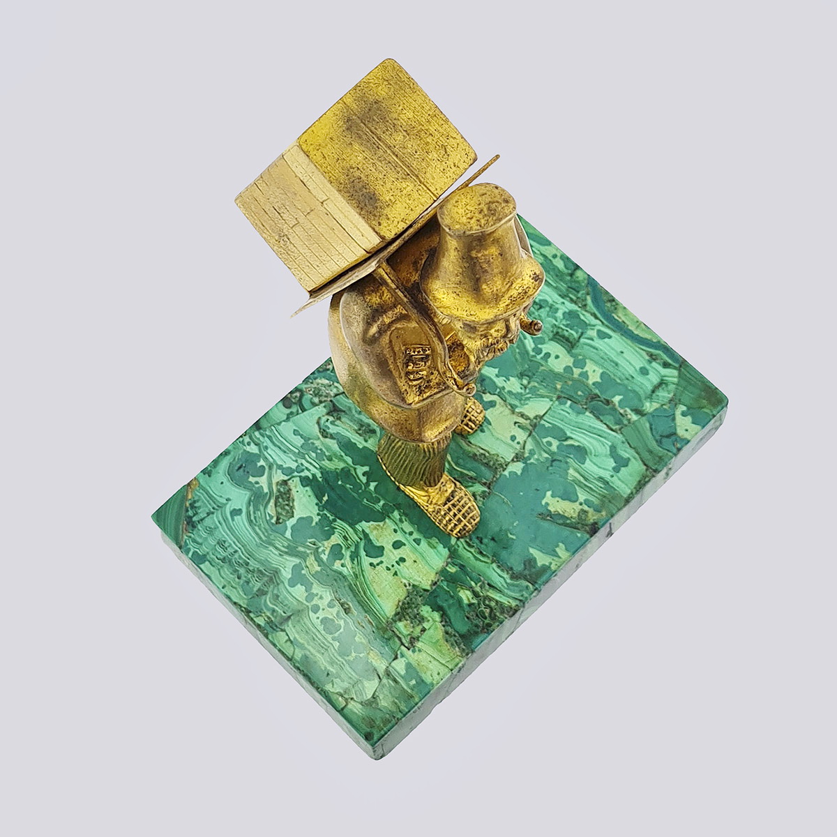 Чернильница «Рабочий козонос» бронза литье на подставке из малахита