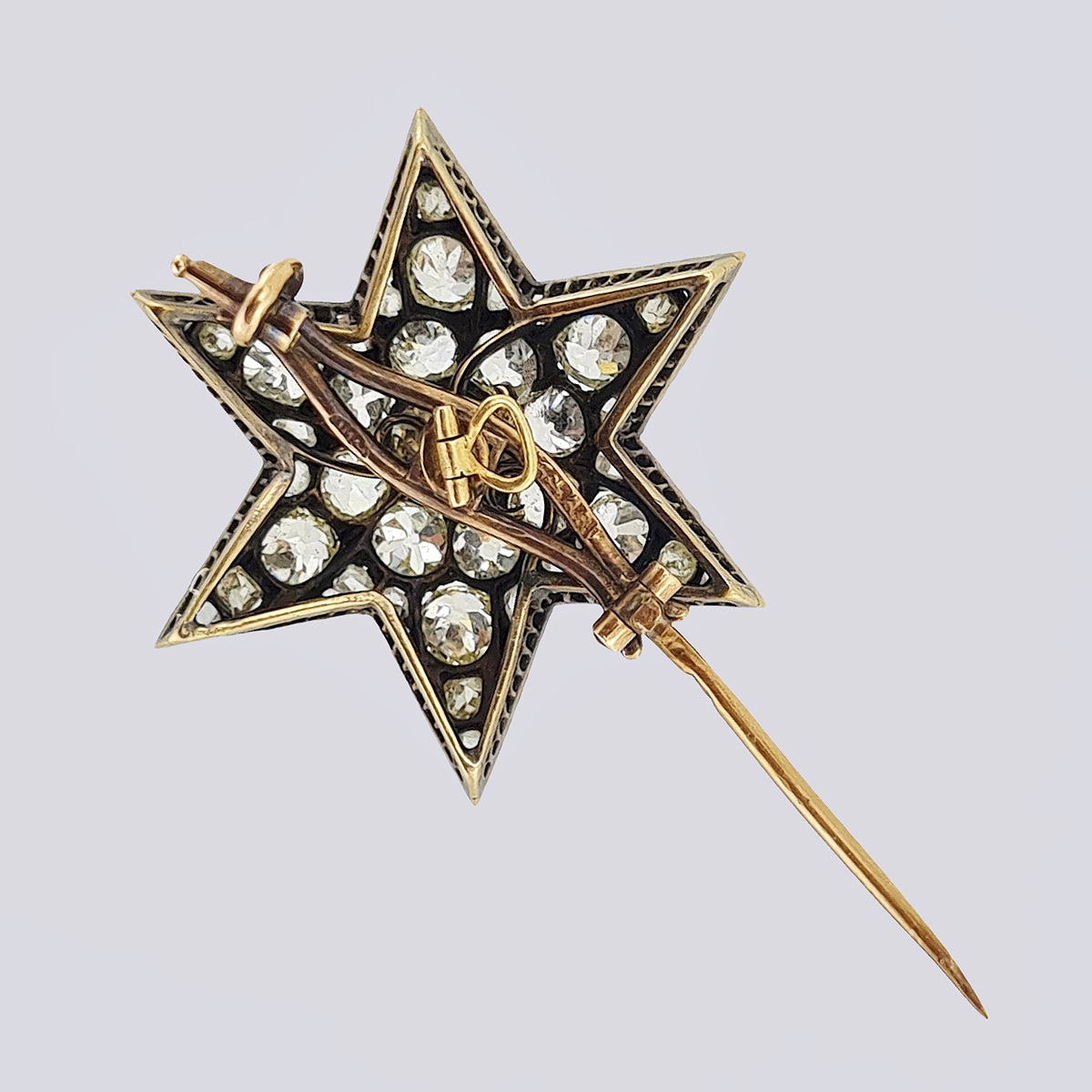 Брошь «Звезда» с бриллиантами и алмазами из золота 56 пробы 19 века