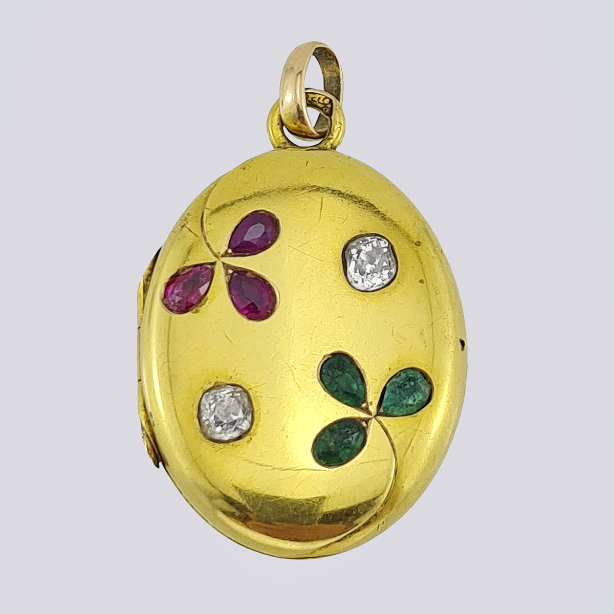 Медальон антикварный золотой 56 пробы с бриллиантами старой огранки, рубинами и изумрудами природными