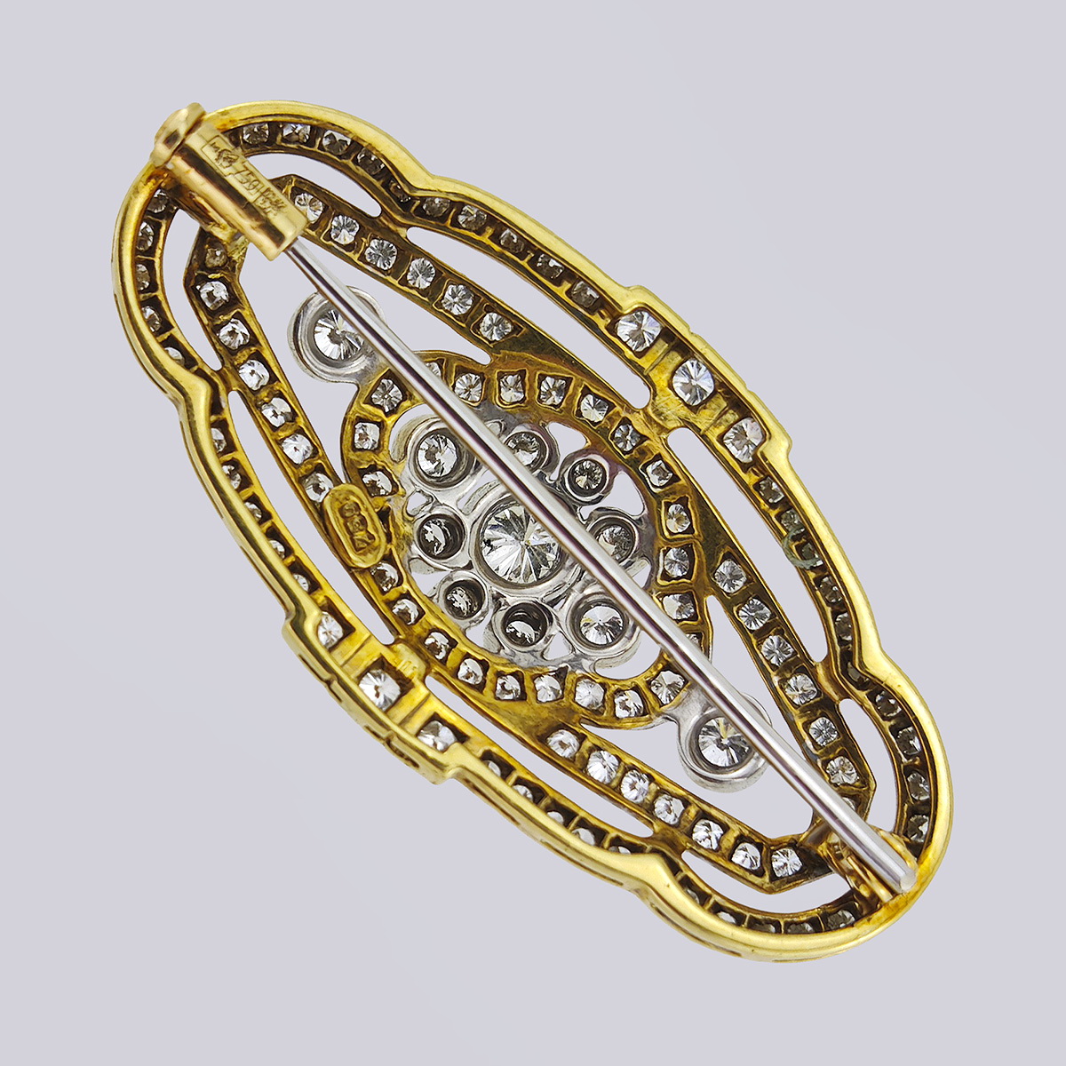 Брошь белого и желтого золота 750 пробы с бриллиантами 