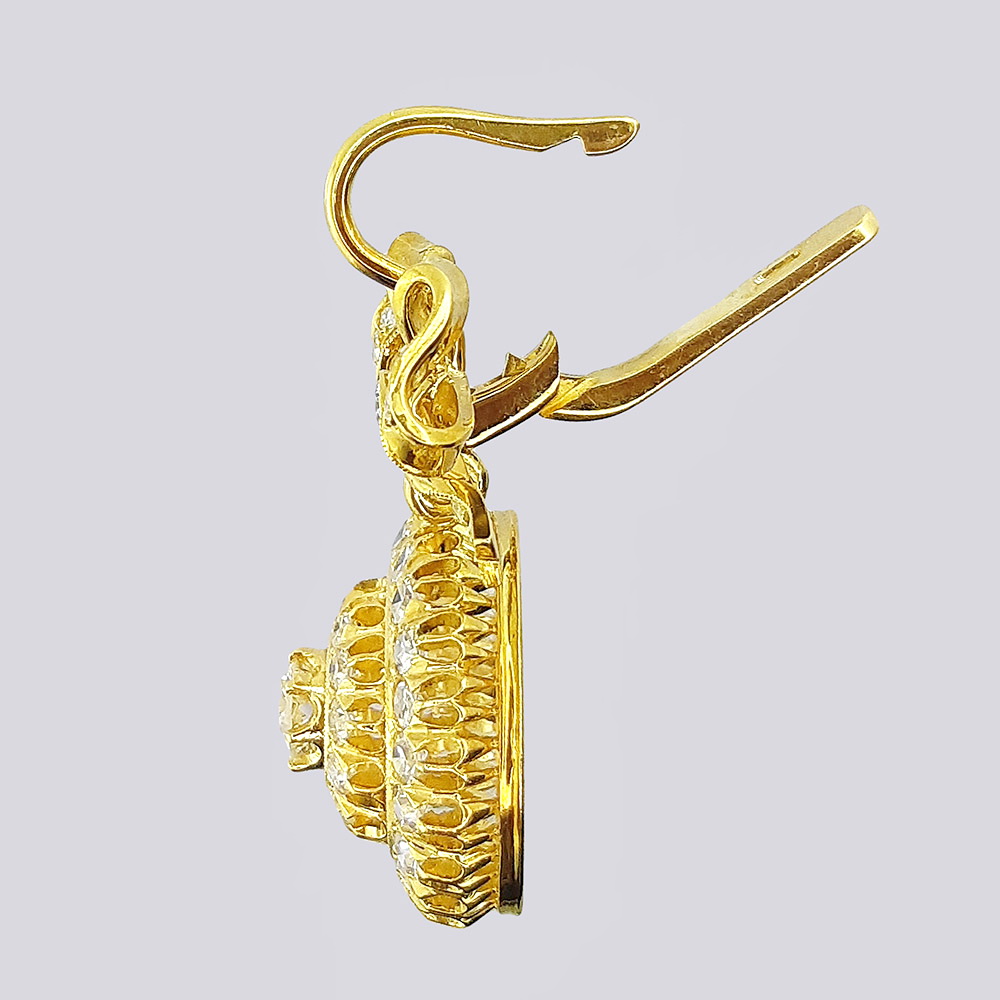 Серьги-подвески с бантами из золота с якутскими бриллиантами