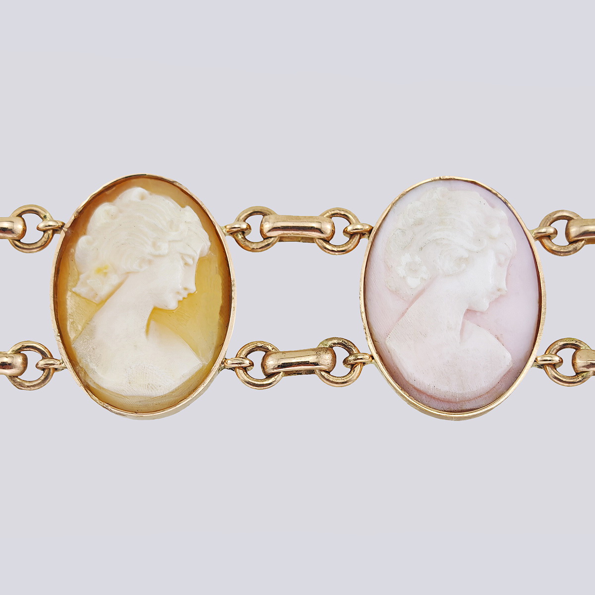 Браслет золотой 585 пробы с шестью камеями на раковине и перламутре