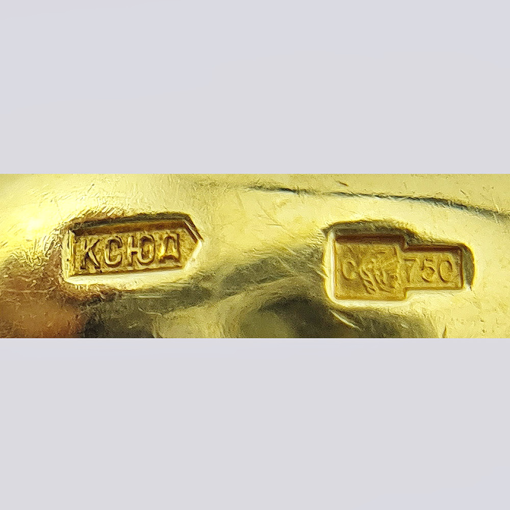 Кольцо с демантоидами из золота 750 пробы