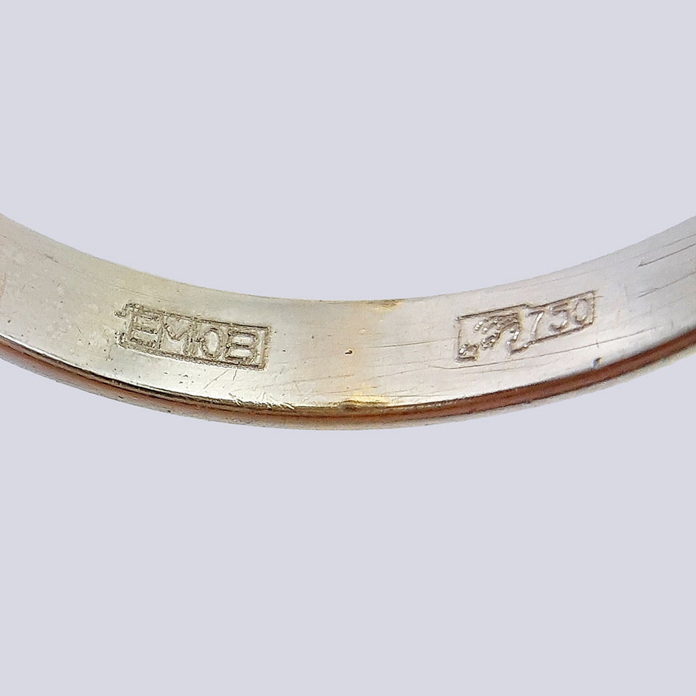 Авторское кольцо со звездчатым сапфиром из золота 750 пробы