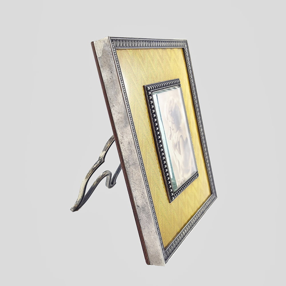Рамка для фотографий из серебра с золотой гильошированной эмалью