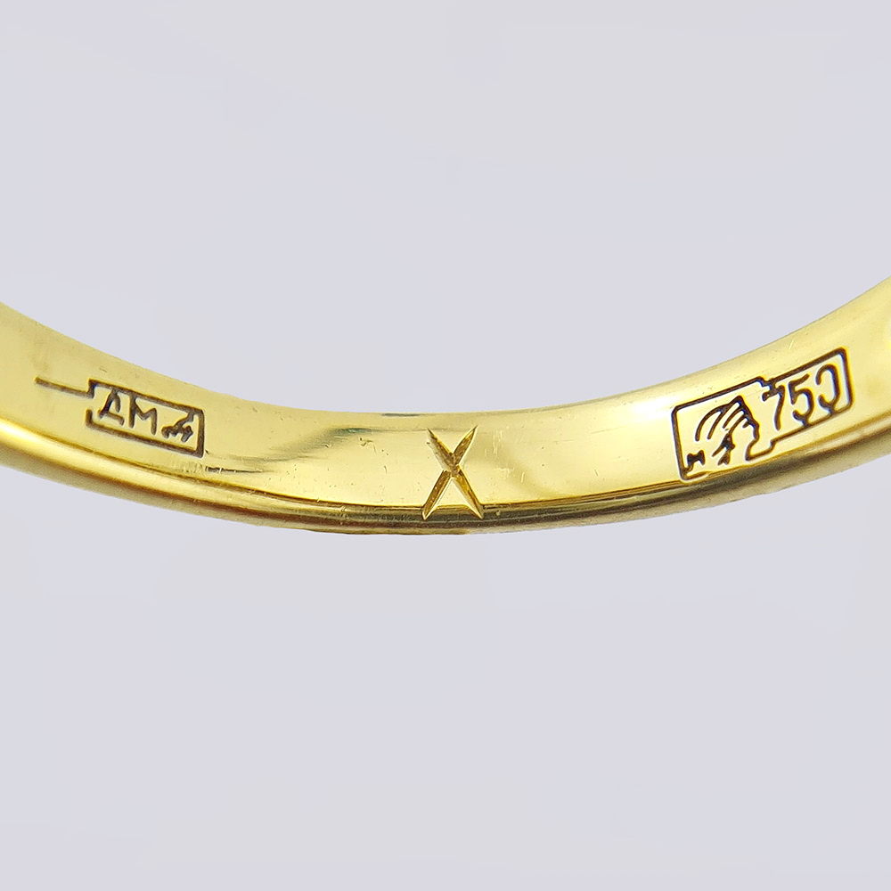 Комплект из золота 750 пробы с бриллиантами кольцо и серьги